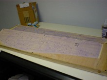 Brads keep the capstrips in place. Wax paper used to keep glue from sticking to blueprint.
